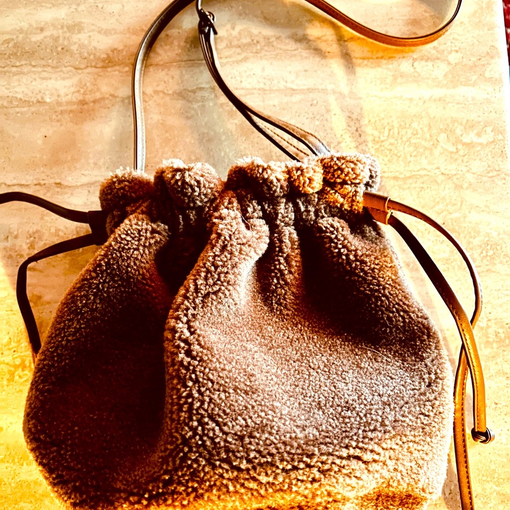 Faux fur tie bag